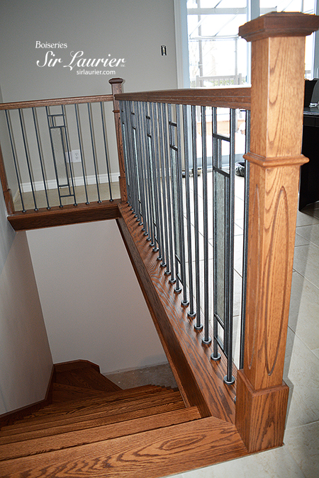 Escalier en bois et barreaux en métal 